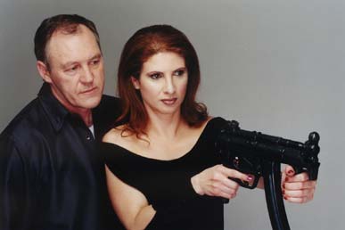 John Fox supervises Danielle Barht before firing the 9mm Heckler & Koch MP 5 K Machinegun 